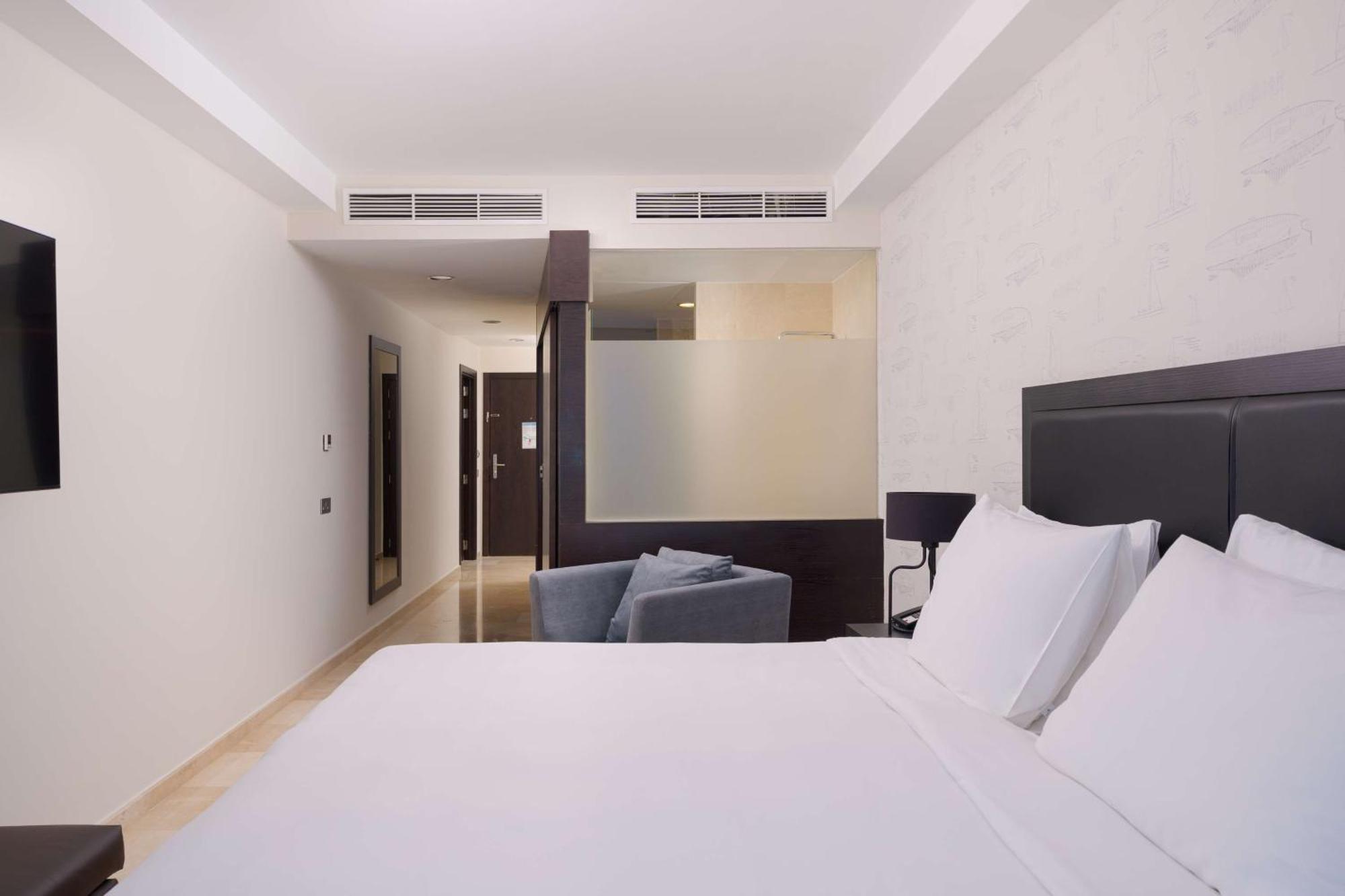 Radisson Blu Resort Gran Canaria La Playa de Arguineguin Exterior photo A room at the hotel